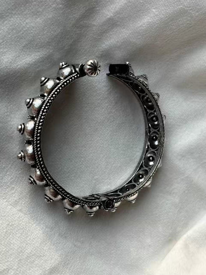 Dotted Oxidised Screw Bangle ( Oxidised Silver )