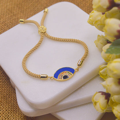 Blue Evil Eye Bracelet in Cream Band -  Gold